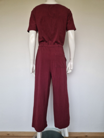Vanilia jumpsuit. Maat 38, Wijnrood.