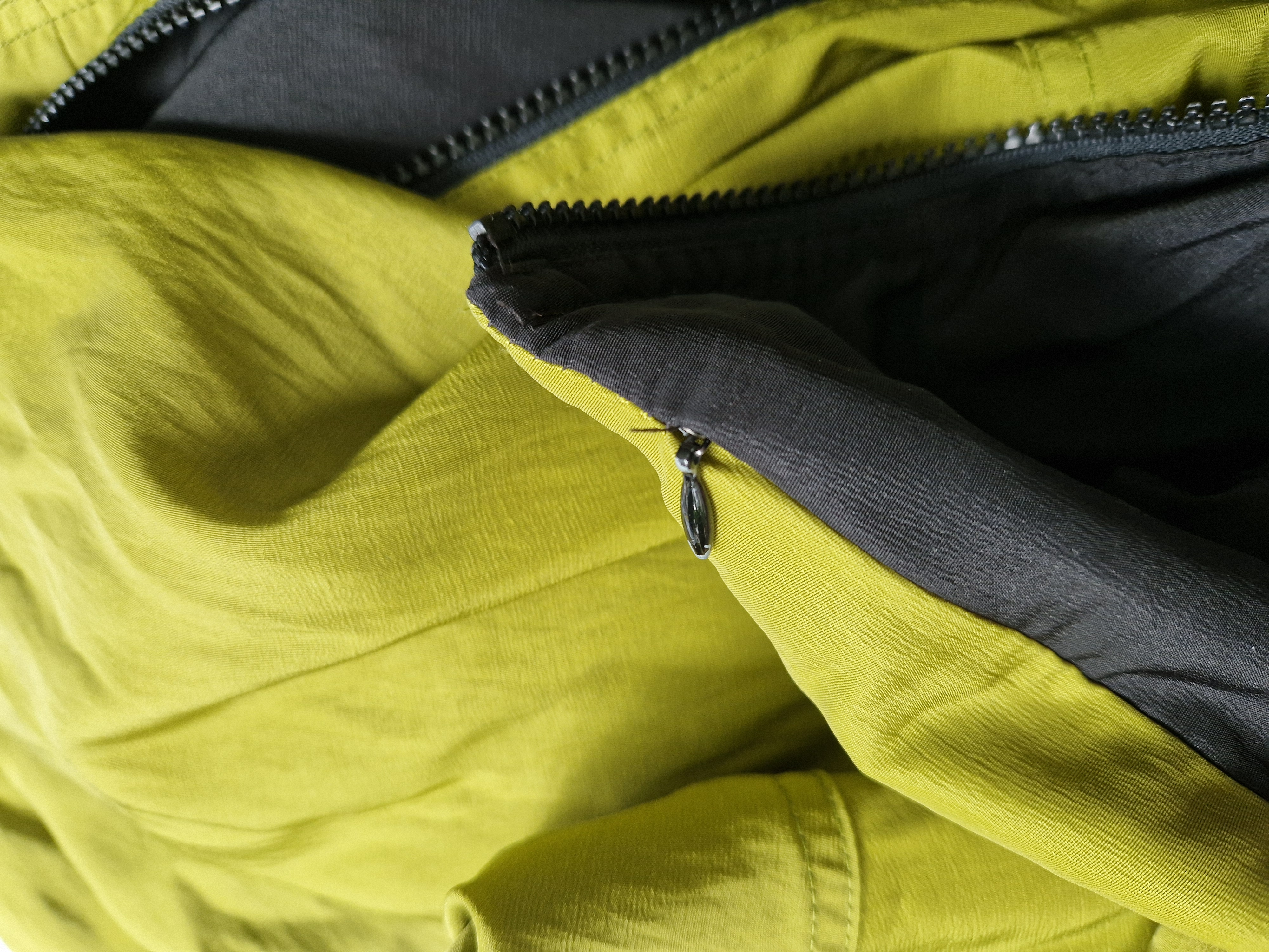 Mycra Pac reversibel regenjas. Maat M. Zwart/limegroen.