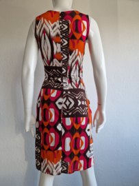 Giovane zomerjurk. Maat 34. Bruin/oranje/roze/print.