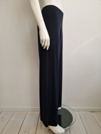 Humanoid pantalon met wijde pijpen. Maat M. Donkerblauw