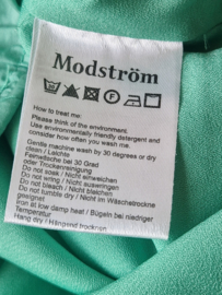 Modstöm top Dino. Maat S. Groen.
