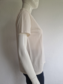 Closed poloshirt. Maat S. Ivoor.