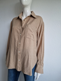 Closed blouse. Maat S. Beige.