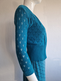 Princesse Nomade vest. Maat S. Turquoise/ ajourgebreid.