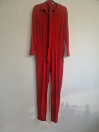Studio Anneloes skinny fit jumpsuit Angelique. Maat L. Rood/travelstof.