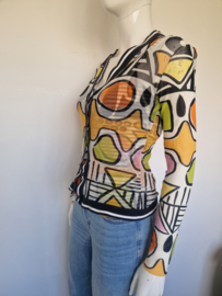 Top en vest. Maat 38. All over print.