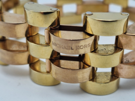 Michael Kors schakelarmband.Stainless steel. Rosé/goud.