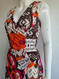Giovane zomerjurk. Maat 34. Bruin/oranje/roze/print.