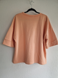 Azzurro oversized T-shirt. Maat OS. Perzik