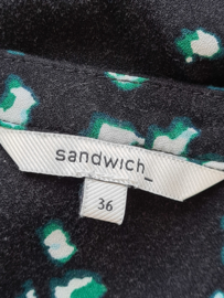 Sandwich jurk. Mt. 36. Zwart/print.