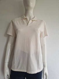 Closed poloshirt. Maat S. Ivoor.