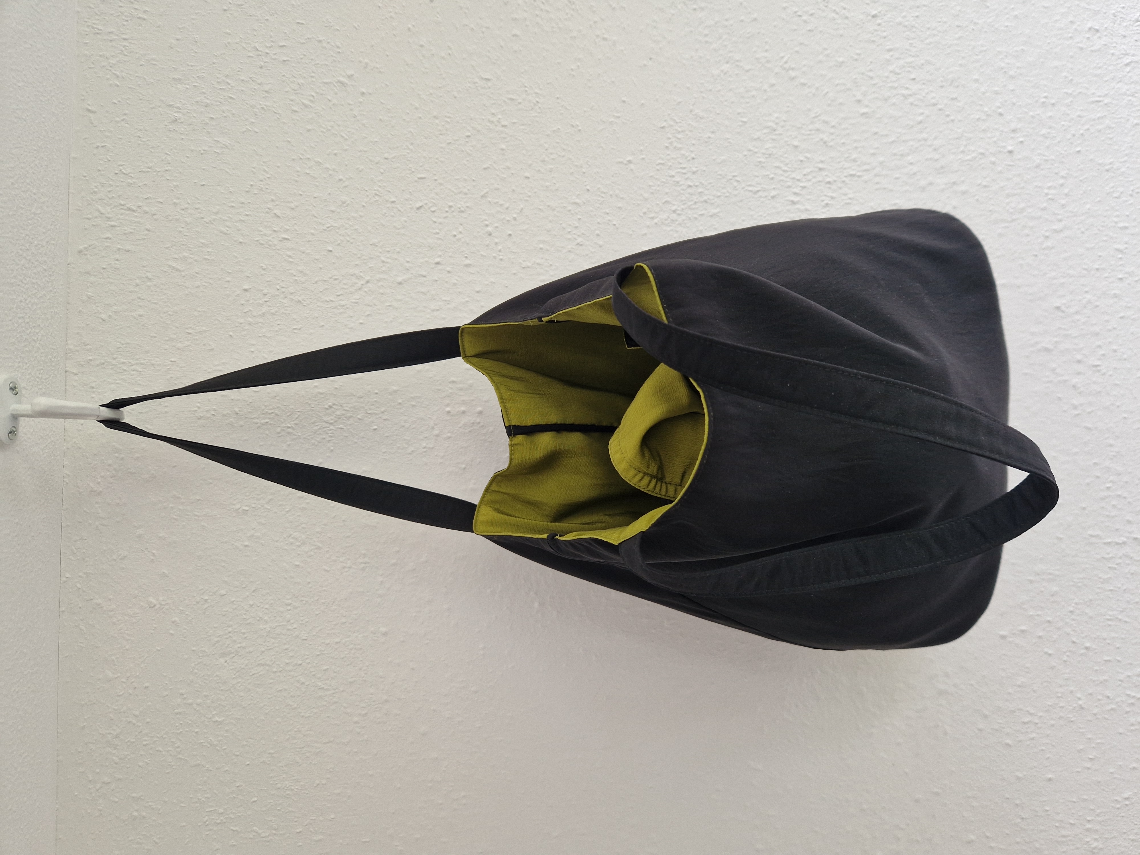 Mycra Pac reversibel regenjas. Maat M. Zwart/limegroen.