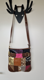 Coach cross body tasje. Patchwork/ diverse materialen.