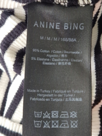Anine Bing gestreepte ribtop. Maat M. Crème/zwart.