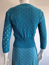 Princesse Nomade vest. Maat S. Turquoise/ ajourgebreid.