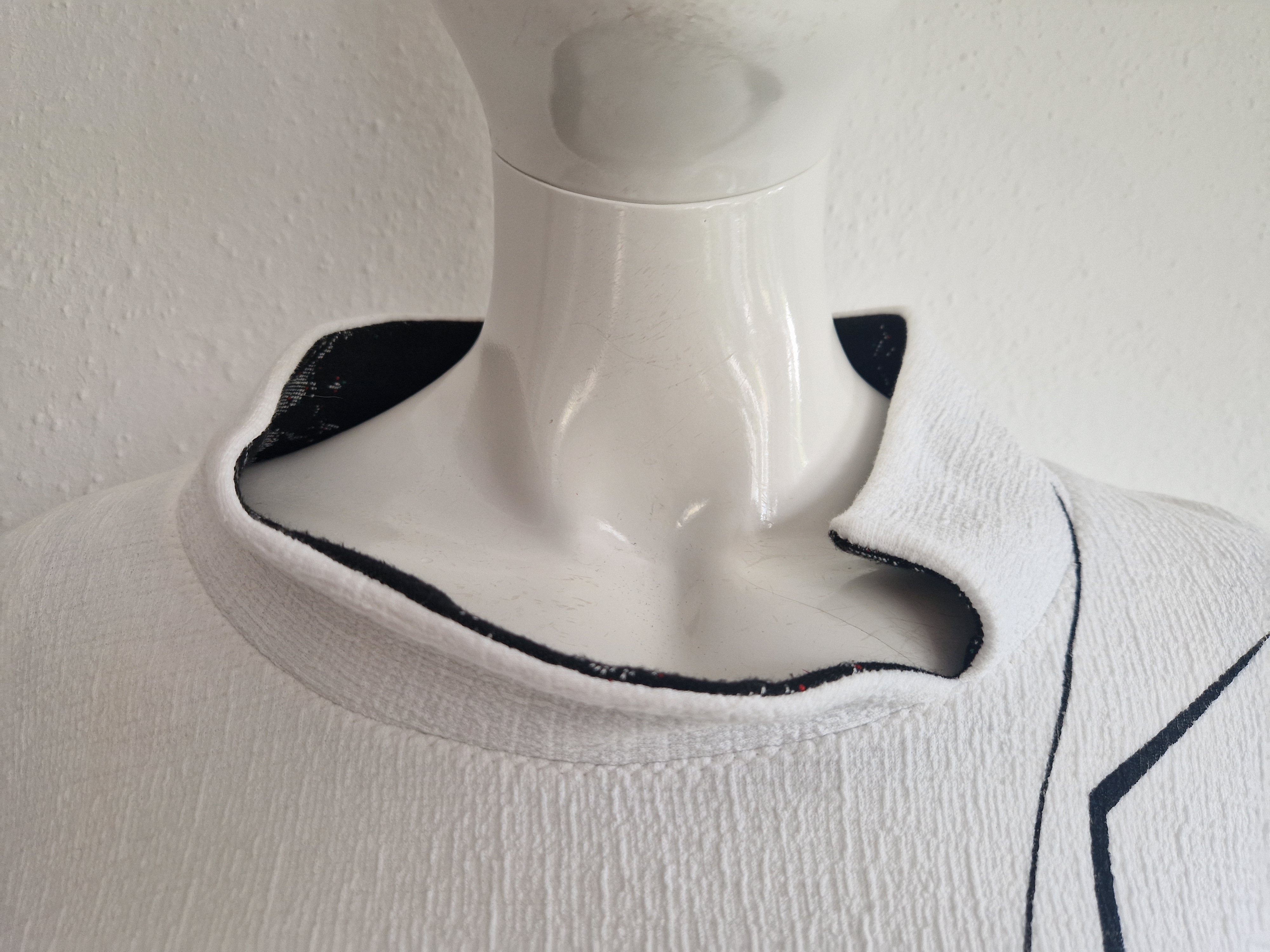 Irma Borgsteede top. Maat M. Wit/grafische print.