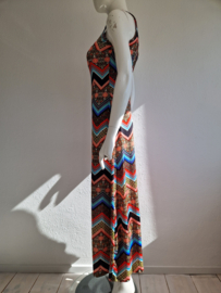 Strandjurk met opengewerkte rug. Maat 36. All over print.