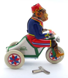 MS 813 ( tin toy monkey on tricycle )