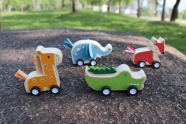 H 071 ( wooden animals pull back ) ----- 8 pcs in display