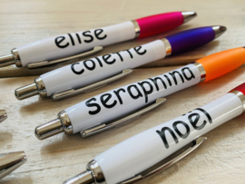 Pens with name in block letters