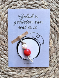 Geluk is genieten van wat er is + gelukspop ROOD