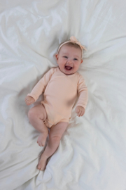 Feetje newborn wikkelromper roze