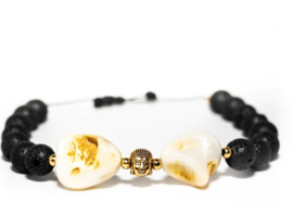 Heavy shell stone, held together by little Buddha