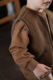 Wollen bodywarmer junior | Pos light | Teddy brown