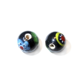 Black glass bead with drawings