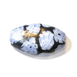 Handmade Black glass bead with blue and white flowerdesign