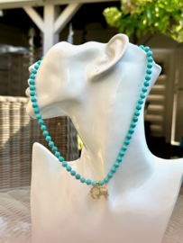 collier turquoise howliet met olifant
