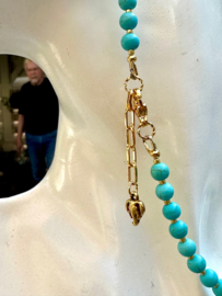 collier turquoise howliet met olifant