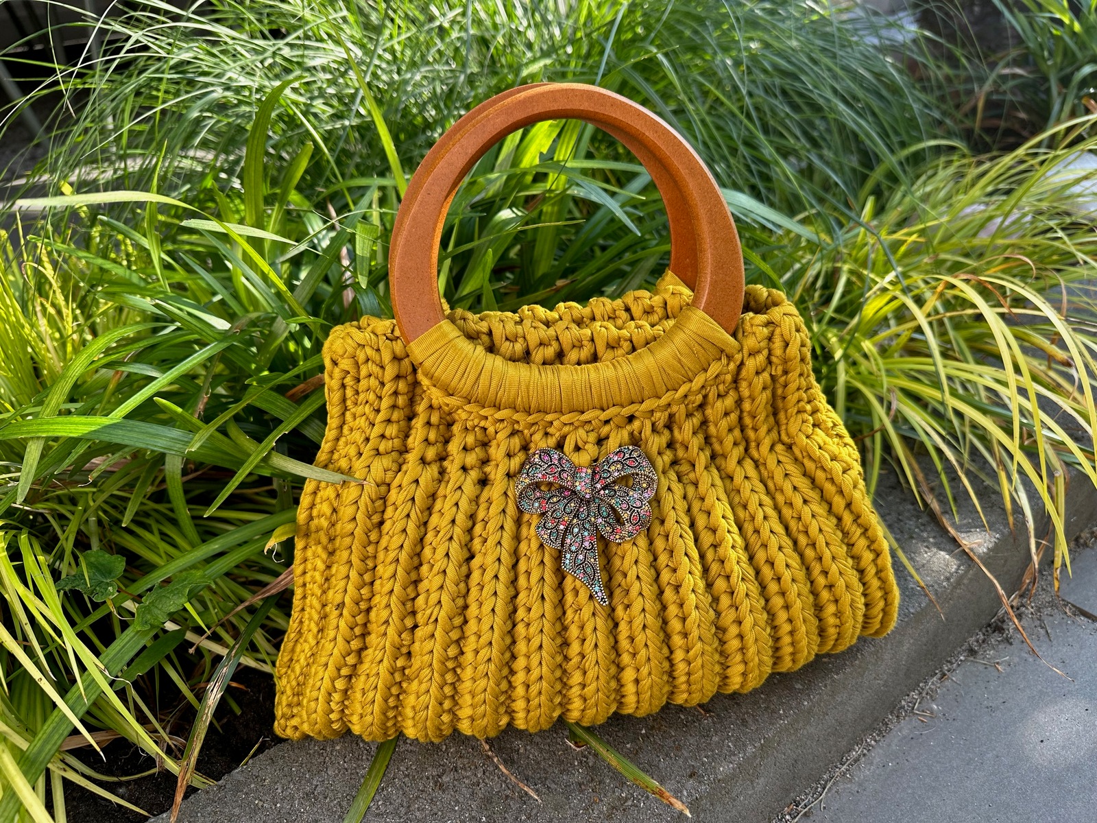Tas Ansi Original handmade met strik broche