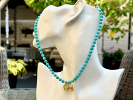 collier turquoise howliet met olifant