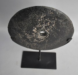 Stone currency on stand, SUMBA, Indonesia, 21st century
