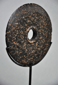 Stone currency on stand, SUMBA, Indonesia, 21st century