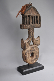 Nepalese ghurra – churning stick holder with cosmic symbolism