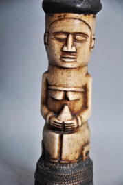 Refined statue of bone, Baule, Ivory Coast, ca 1980