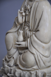 Beautiful Kwan Yin statue of "blanc de Chine" porcelain