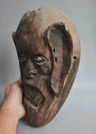 Expressive festival mask from the Terai, Tharu people, Nepal, ca 1970
