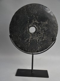 Stone currency on stand, SUMBA, Indonesia, 21st century