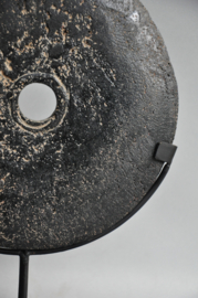 Stone currency on stand, SUMBA, Indonesia, 21st century
