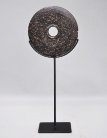 Stone currency on stand, SUMBA, Indonesia, 21st century