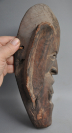 Expressive festival mask from the Terai, Tharu people, Nepal, ca 1970