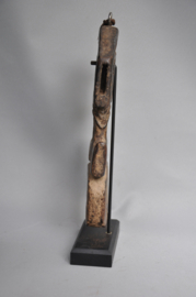 Nepalese ghurra – churning stick holder with cosmic symbolism