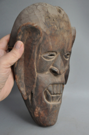 Expressive festival mask from the Terai, Tharu people, Nepal, ca 1970