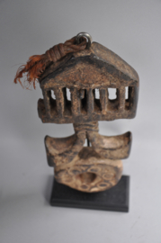 Nepalese ghurra – churning stick holder with cosmic symbolism