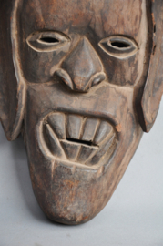 Expressive festival mask from the Terai, Tharu people, Nepal, ca 1970