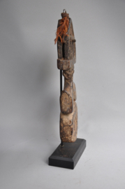 Nepalese ghurra – churning stick holder with cosmic symbolism