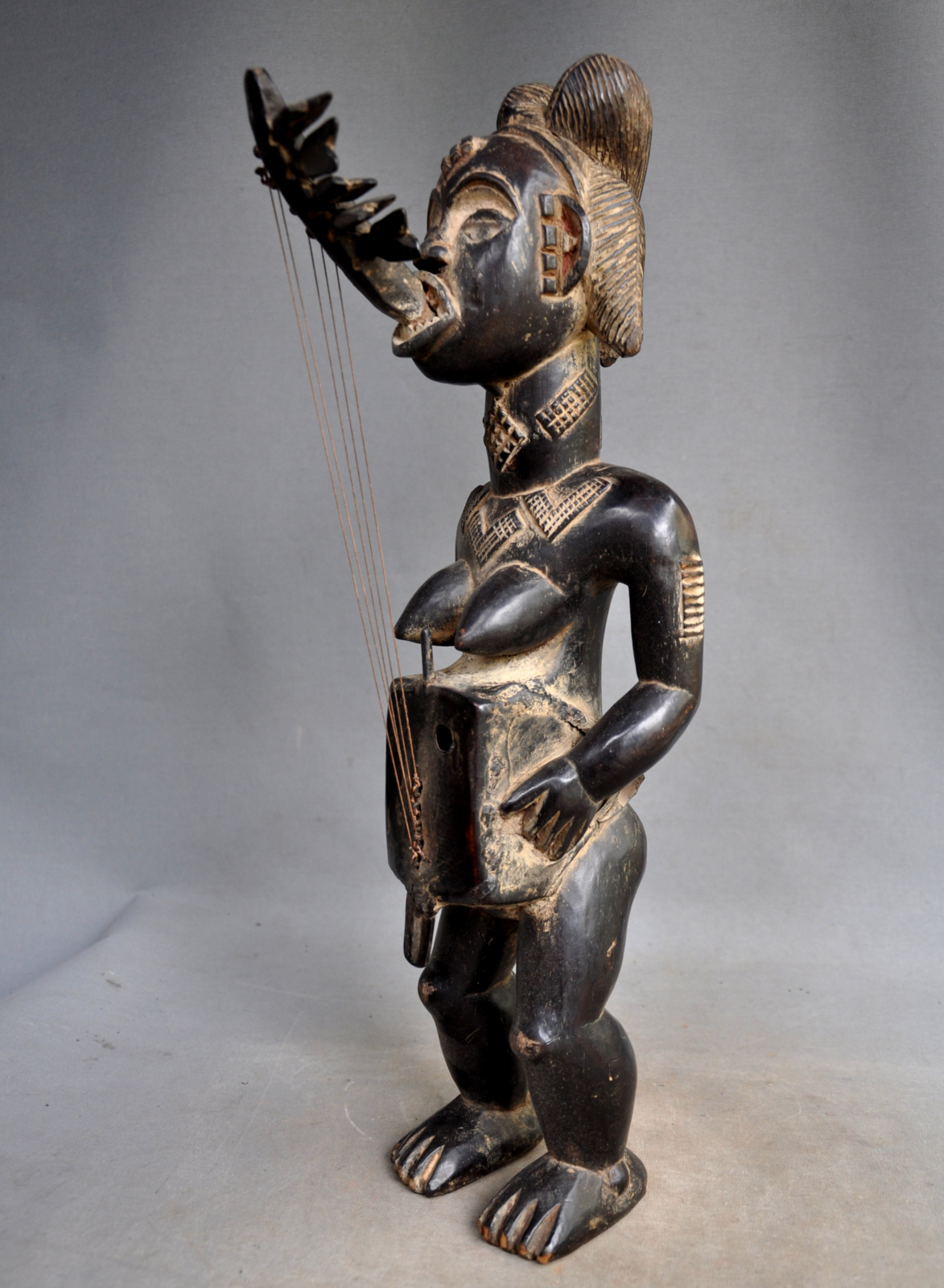 Prachtig harp beeld van de PUNU stam uit Gabon, 2e helft 20e eeuw